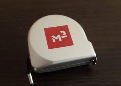 Брендовані рулетки для компанії «Квадратний метр»